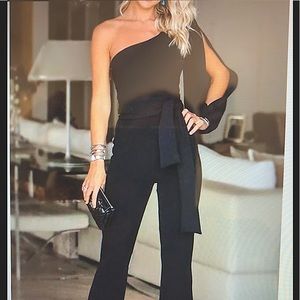 Black jumpsuit. Brand New with tags. Size XL.